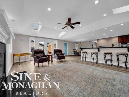 Chandelier, Fireplace, Interior, Kitchen, Living room, Recessed Lighting, Stainless Steel Appliances, Wood Texture Flooring