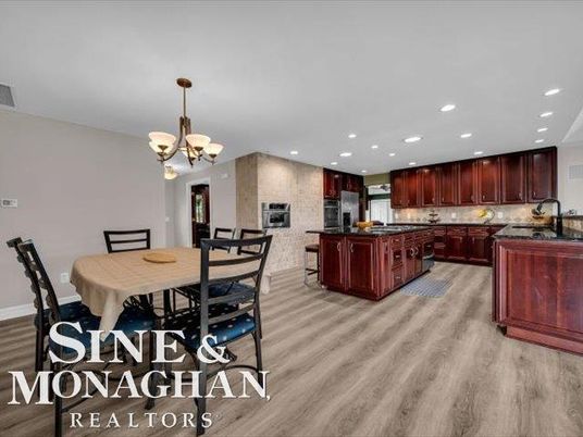 Chandelier, Dining room, Interior, Kitchen, Recessed Lighting, Stainless Steel Appliances, Wood Texture Flooring