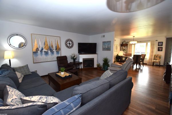 Dining room, Fireplace, Interior, Living room, Pendant Lights, Wood Texture Flooring