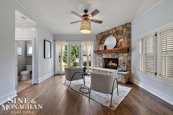 Bathroom, Fireplace, Interior, Living room, Recessed Lighting, Stone Walls, Wood Texture Flooring