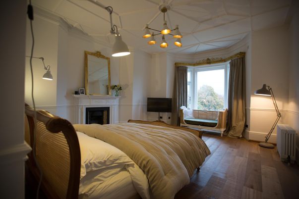 Bedroom, Fireplace, Interior, Pendant Lights, Wood Texture Flooring