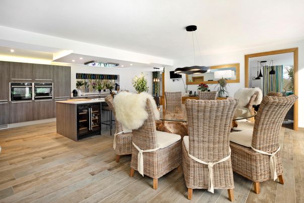 Dining room, Interior, Kitchen, Pendant Lights, Recessed Lighting, Stainless Steel Appliances, Wood Texture Flooring