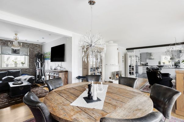 Chandelier, Dining room, Fireplace, Interior, Living room, Pendant Lights, Recessed Lighting, Stone Walls, Wood Texture Flooring