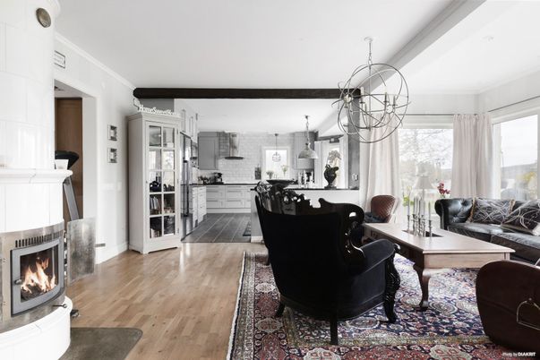 Dining room, Fireplace, Interior, Kitchen, Living room, Pendant Lights, Stainless Steel Appliances, Wood Texture Flooring