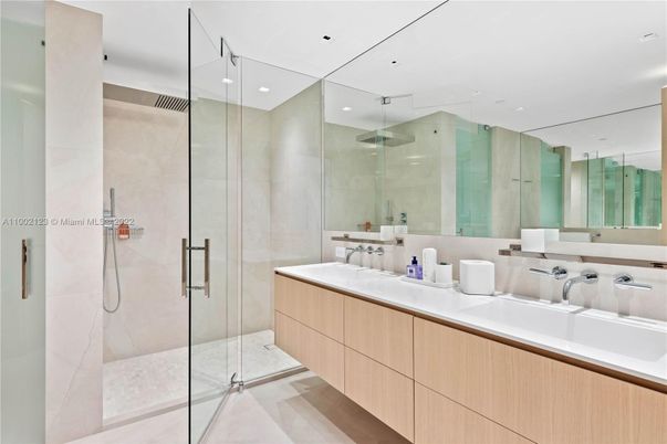 Bathroom, Dual Sink Vanities, Glass Shower, Interior, Recessed Lighting, Wood Texture Flooring