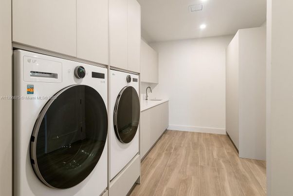 Interior, Recessed Lighting, Utility Closets, Washer, Wood Texture Flooring