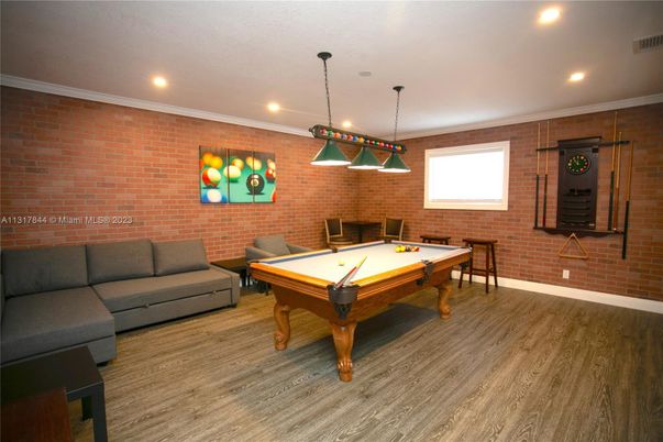 Billiard Table, Game Room, Interior, Pendant Lights, Recessed Lighting, Stone Walls, Wood Texture Flooring