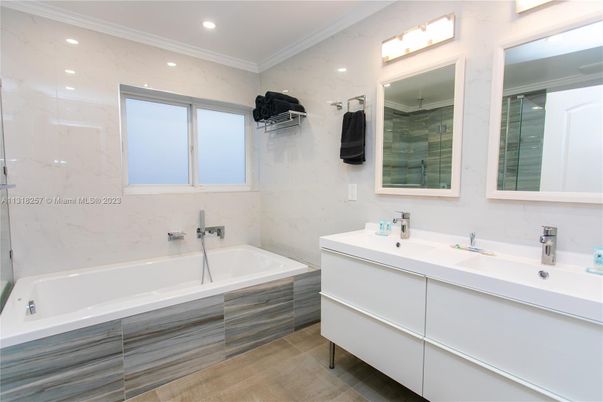 Bathroom, Dual Sink Vanities, Interior, Marble Walls, Recessed Lighting