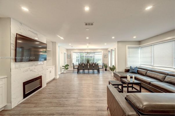Dining room, Fireplace, Interior, Kitchen, Living room, Pendant Lights, Recessed Lighting, Wood Texture Flooring