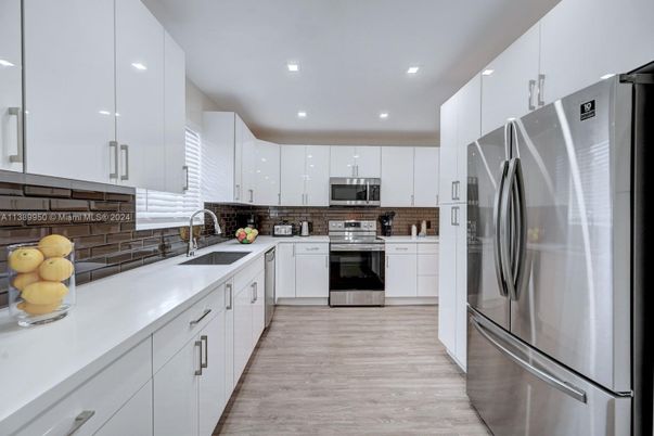Interior, Kitchen, Recessed Lighting, Stainless Steel Appliances, Wood Texture Flooring
