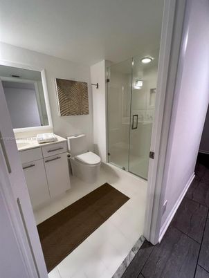 Bathroom, Glass Shower, Interior, Recessed Lighting, Wood Texture Flooring
