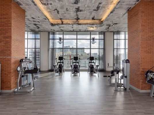 Fitness Equipment, Gym, Interior, Stone Walls, Wood Texture Flooring