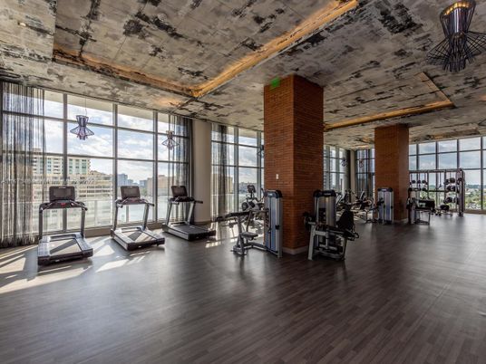 Fitness Equipment, Gym, Interior, Stone Walls, Wood Texture Flooring