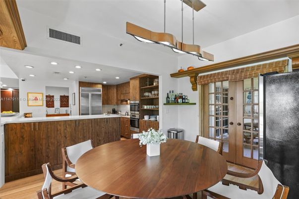 Dining room, Interior, Kitchen, Pendant Lights, Recessed Lighting, Stainless Steel Appliances, Wood Texture Flooring
