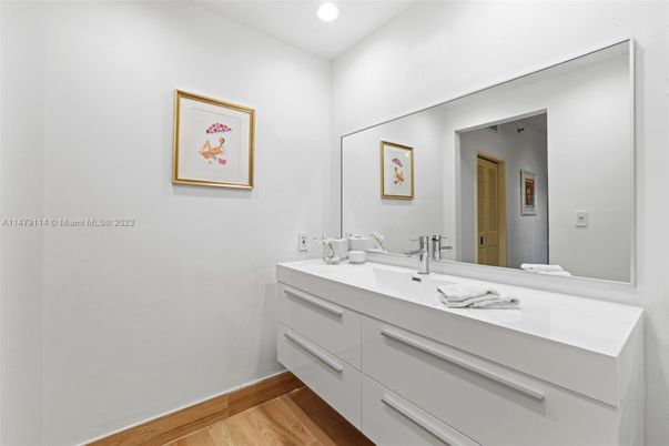 Bathroom, Dual Sink Vanities, Interior, Recessed Lighting, Wood Texture Flooring