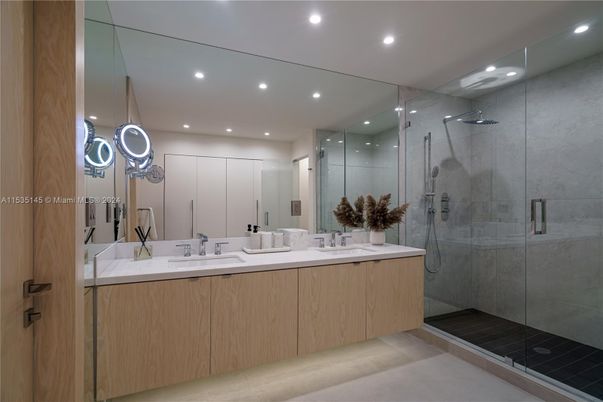 Bathroom, Dual Sink Vanities, Glass Shower, Interior, Recessed Lighting, Wood Texture Flooring