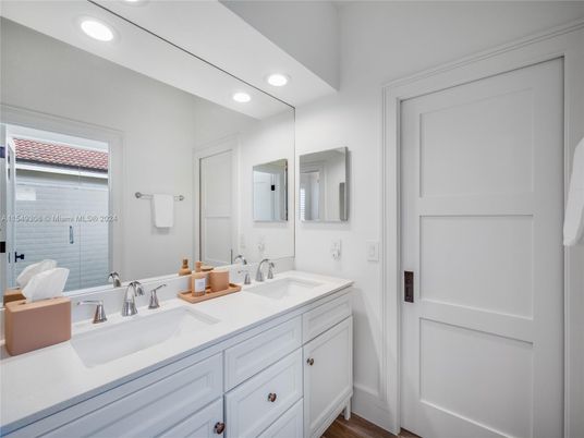 Bathroom, Dual Sink Vanities, Interior, Recessed Lighting, Wood Texture Flooring