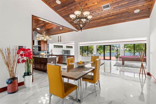 Billiard Table, Chandelier, Dining room, Game Room, Interior, Kitchen, Marble, Pendant Lights, Recessed Lighting, Stainless Steel Appliances, Wooden Ceilings