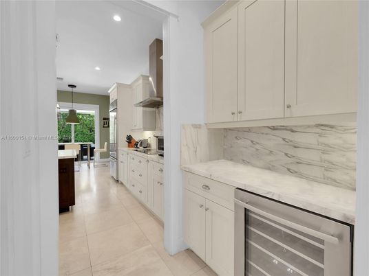 Dining room, Interior, Kitchen, Marble Walls, Pendant Lights, Recessed Lighting, Stainless Steel Appliances