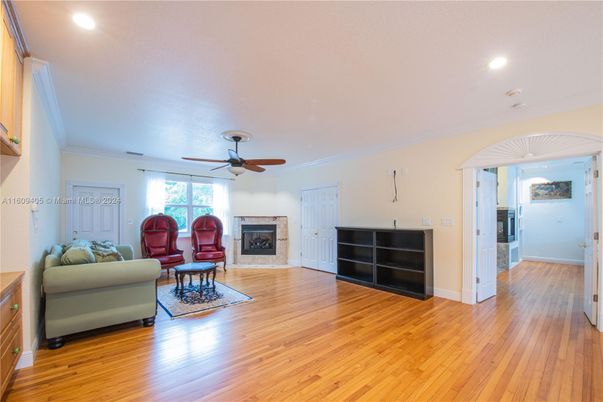 Fireplace, Interior, Living room, Recessed Lighting, Wood Texture Flooring
