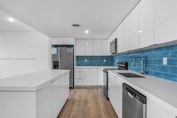 Interior, Kitchen, Recessed Lighting, Stainless Steel Appliances, Wood Texture Flooring