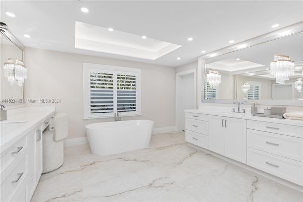 Bathroom, Chandelier, Dual Sink Vanities, Free Standing Baths, Interior, Marble, Pendant Lights, Recessed Lighting