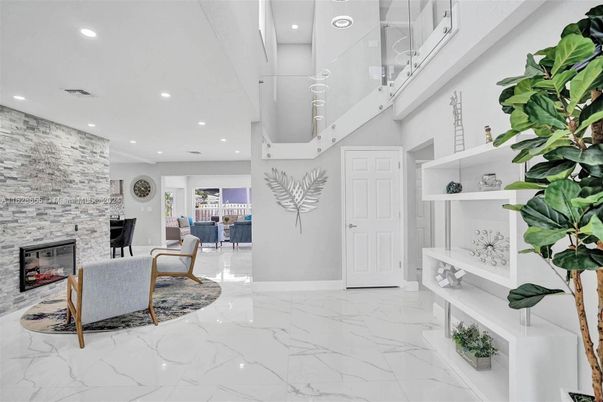 Fireplace, Interior, Living room, Marble, Recessed Lighting, Stone Walls