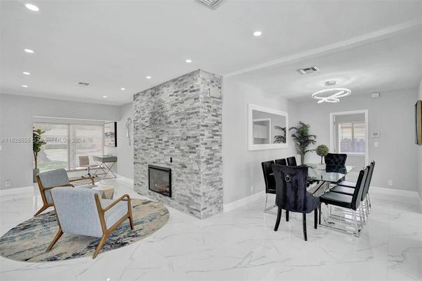 Dining room, Fireplace, Interior, Marble, Pendant Lights, Recessed Lighting, Stone Walls