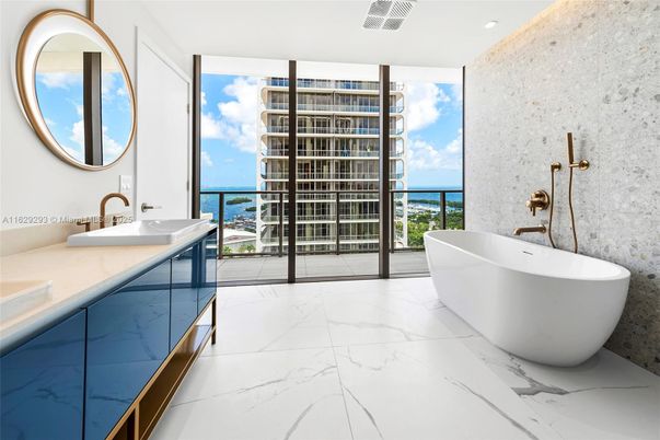 Bathroom, Dual Sink Vanities, Free Standing Baths, Interior, Marble, Recessed Lighting, Water