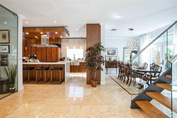 Dining room, Interior, Kitchen, Marble Walls, Pendant Lights, Recessed Lighting, Stainless Steel Appliances