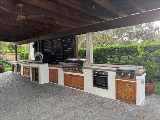 Interior, Kitchen, Living room, Pendant Lights, Recessed Lighting, Stainless Steel Appliances, Stone Walls, Wood Texture Flooring
