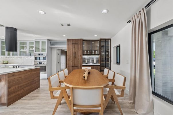 Dining room, Interior, Kitchen, Recessed Lighting, Stainless Steel Appliances, Wood Texture Flooring