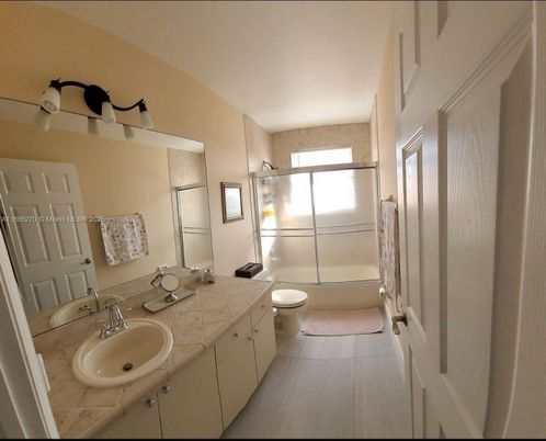 Bathroom, Dual Sink Vanities, Glass Shower, Interior, Tile Countertops