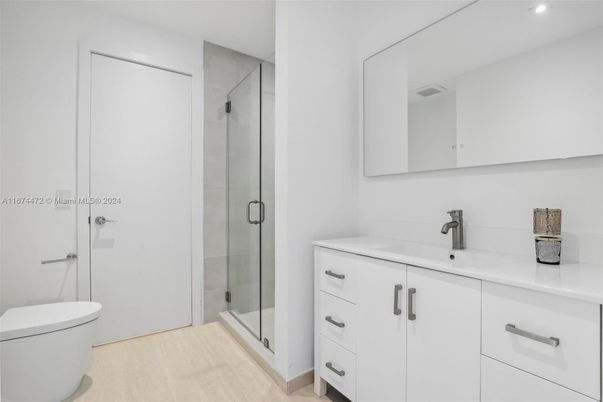 Bathroom, Glass Shower, Interior, Recessed Lighting, Wood Texture Flooring