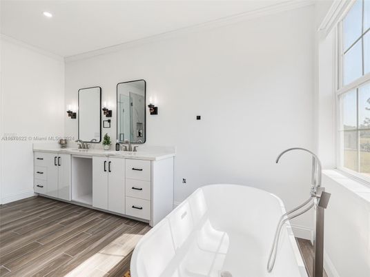 Bathroom, Dual Sink Vanities, Free Standing Baths, Interior, Recessed Lighting, Wood Texture Flooring