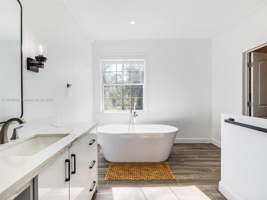 Bathroom, Dual Sink Vanities, Free Standing Baths, Interior, Recessed Lighting, Wood Texture Flooring