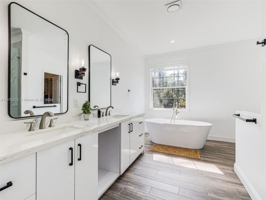 Bathroom, Dual Sink Vanities, Free Standing Baths, Interior, Recessed Lighting, Wood Texture Flooring
