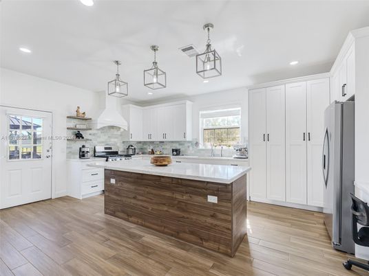 Interior, Kitchen, Pendant Lights, Recessed Lighting, Stainless Steel Appliances, Wood Texture Flooring