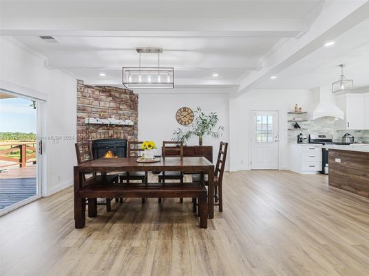 Dining room, Fireplace, Interior, Kitchen, Pendant Lights, Recessed Lighting, Stone Walls, Wood Texture Flooring