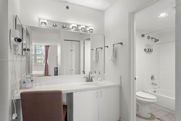 Bathroom, Dual Sink Vanities, Interior, Recessed Lighting, Wood Texture Flooring