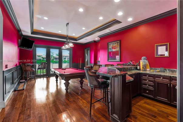 Billiard Table, Chandelier, Game Room, Interior, Pendant Lights, Recessed Lighting, Wood Texture Flooring