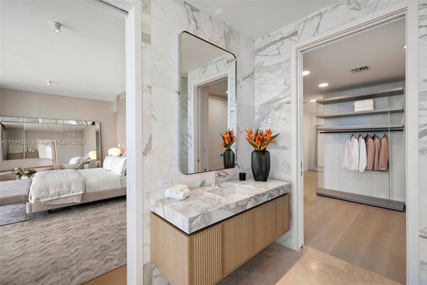 Bathroom, Bedroom, Dual Sink Vanities, Interior, Marble Walls, Recessed Lighting, Wood Texture Flooring