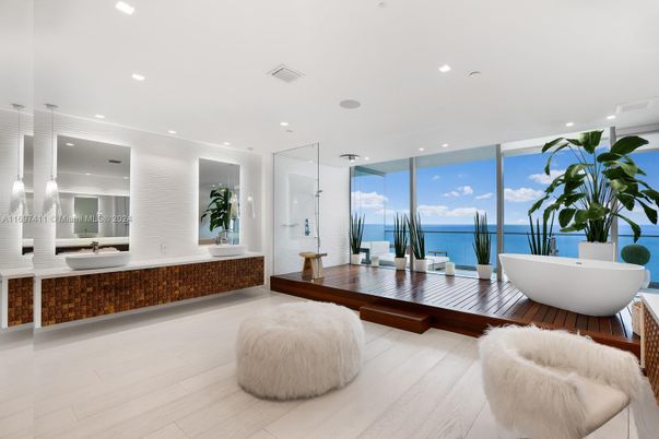 Bathroom, Free Standing Baths, Interior, Recessed Lighting, Water, Wood Texture Flooring