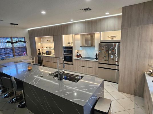 Interior, Kitchen, Pendant Lights, Recessed Lighting, Stainless Steel Appliances, Tile Countertops