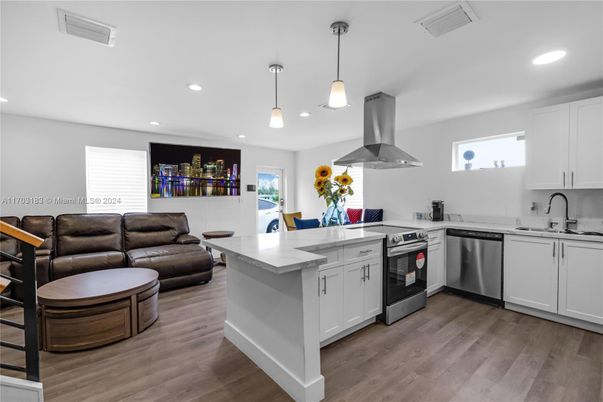 Interior, Kitchen, Pendant Lights, Recessed Lighting, Stainless Steel Appliances, Wood Texture Flooring