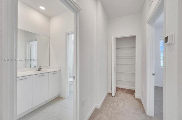 Bathroom, Dual Sink Vanities, Interior, Recessed Lighting, Walk-in Closets