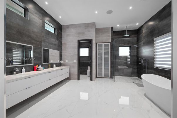 Bathroom, Dual Sink Vanities, Free Standing Baths, Glass Shower, Interior, Marble, Recessed Lighting