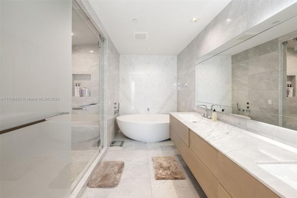 Bathroom, Dual Sink Vanities, Free Standing Baths, Glass Shower, Interior, Marble, Marble Walls, Recessed Lighting