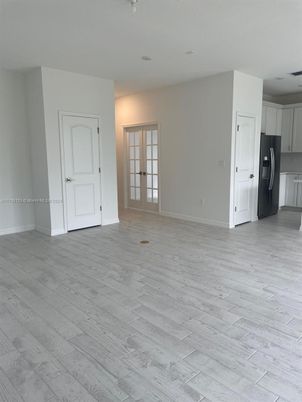 Empty room, Interior, Recessed Lighting, Washer, Wood Texture Flooring