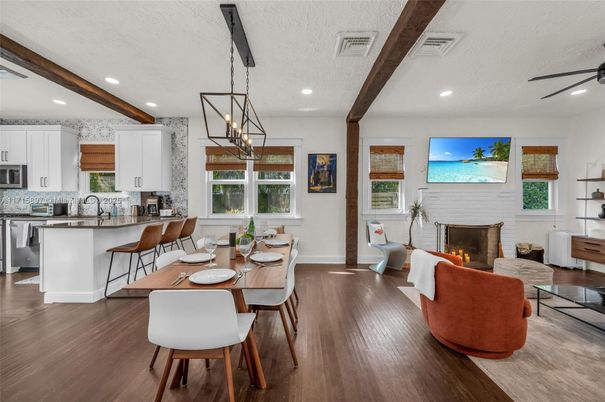 Dining room, Fireplace, Interior, Kitchen, Living room, Pendant Lights, Recessed Lighting, Stainless Steel Appliances, Wooden Beams, Wood Texture Flooring